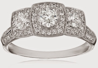 three-stone halo engagement ring